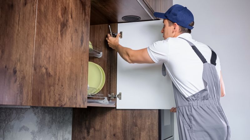 Skilled Craftsmen Installing Cabinets